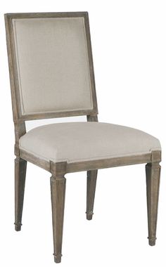 an upholstered chair with a beige fabric seat and backrest, on a white background