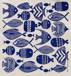 a blue and white drawing of many fish