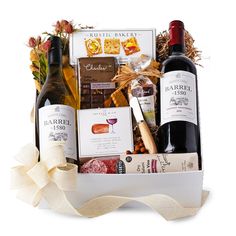 a wine gift basket with two bottles of wine