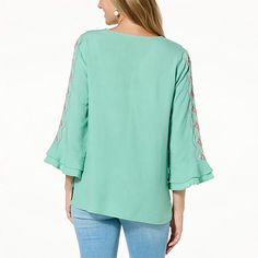 Colleen Lopez Embroidered Woven Tunic  Pretty floral embroidery details this lightweight tunic, an elegantly easygoing look that elevates casual outfits. Casual V-neck Blouse With Embroidered Sleeves, Casual V-neck Top With Embroidered Sleeves, Casual V-neck Blouse With Embroidered Hem, Spring Casual Blouse With Floral Embroidery, Spring Long Sleeve Tops With Embroidered Neckline, Spring Long Sleeve Tops With Embroidered Sleeves, Summer Tunic Top With Embroidered Sleeves, Casual Rayon Tunic For Spring, Casual Embroidered Top With Relaxed Fit For Spring