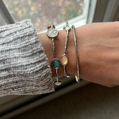 Beautiful Sterling Silver Ippolita Bracelet Stack With One Plain Single Bangle , One With 5 Smaller Stones And One With 6 Larger Stones . Some Natural Tarnish And Wear. Stone Colors Are Pink And Clear On The Smaller Stones And Pink, Green And Mother Of Pearl On The Larger Single Bangle, Ippolita Jewelry, Bracelet Stack, Womens Jewelry Bracelets, Mother Of Pearl, Stone Color, Silver Jewelry, Bangles, Gems