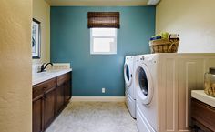 a washer and dryer in a small room