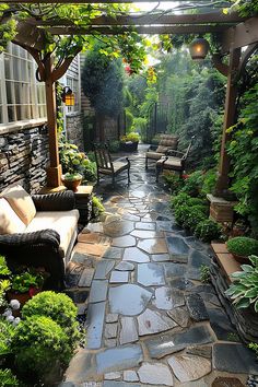 an outdoor patio with stone walkway and seating area