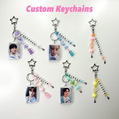 the keychains are decorated with photos and beads