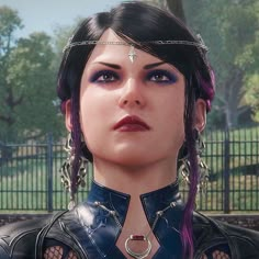 an image of a woman with purple hair and piercings on her head in the video game mass effect