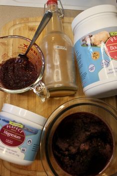 ingredients to make chocolate cake sitting on a cutting board next to a jar of pudding