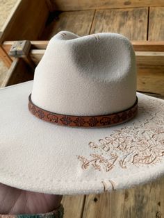 * Handmade by a small business in Texas * Measures 0.5" x 20" * Adjustable to fit the crown of your hat * Made with quality materials * Perfect for rodeos, shows, or just adding a touch of western to your hat! * Check out other hat band designs in my Etsy shop! Brown Adjustable Mini Hat With Short Brim, Adjustable Brown Mini Hat With Short Brim, Adjustable Brown Mini Hat With Flat Brim, Adjustable Cream Hat For Western-themed Events, Adjustable Country Hat With Flat Crown, Adjustable Country Style Hat With Flat Crown, Adjustable Cream Hats For Ranch, Adjustable Cream Hat For Ranch, Brown Adjustable Mini Hat With Curved Brim