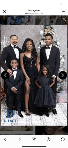 a family posing for a photo in front of a christmas tree