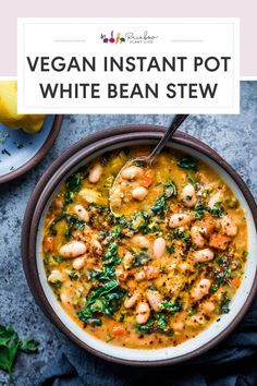 a bowl of vegan instant pot white bean stew with spinach and shrimp in it