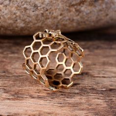 "Brass Honeycomb Ring, Minimalist Jewelry, Bee Ring, Handmade Ring, Geometric Ring, Christmas Day Gift Size:- All Size Available In Variation Metal:- Brass IMPORTANT NOTE....👇 1 product free gift on purchase of 3 products. You can choose the free gift as your wish. Take a screenshot of the free gift you like from my shop and send me a photo in personal message. MUST READ....👇 5 stars is my shop's priority. So contact me before leaving any negative review. I am here only for my dear customers. Honeycomb Ring, Ring Geometric, Bee Ring, Geometric Ring, Ring Minimalist, Christmas Day, Must Read, Ring Handmade, Gold Style