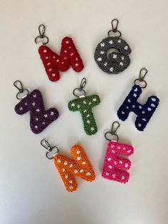 the letters are made out of beads and sequins