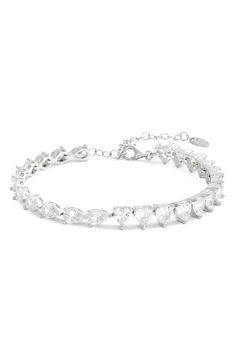 You'll love the shimmer of this classic tennis bracelet lined with heart-cut and pear-cut cubic zirconia. 6" length; 2" extender Sterling silver/14k-gold or rhodium plate/cubic zirconia Imported Bracelet In Silver, Pear Cut, Tennis Bracelet, Womens Jewelry Bracelets, Rhodium Plated, Diamond Bracelet, Cubic Zirconia, Pear, Silver Bracelet