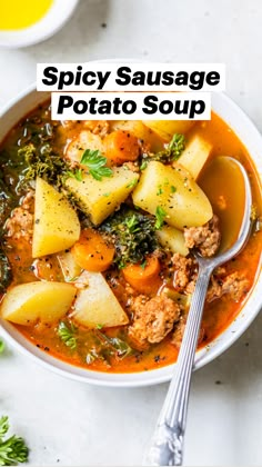 a white bowl filled with meat and vegetable soup next to some parsley on the side