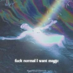 an image of a woman floating in the water with a rainbow colored light coming out of her body