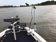 a motor boat with an outboard motors on the water