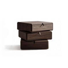 three wooden boxes stacked on top of each other