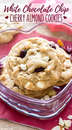 white chocolate chip cherry almond cookies in a glass bowl on a red napkin with text overlay