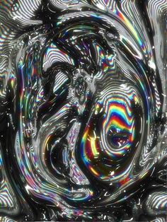 an abstract photo with multicolored lines and swirls