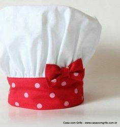 a red and white polka dot chef hat