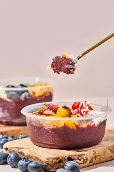 blueberry cheesecake in a bowl being spooned out