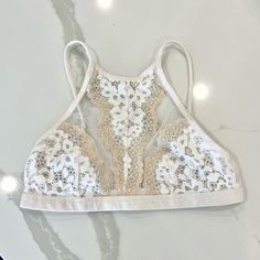 Victoria's Secret Body By Victoria High Neck Halter Bralette White Xs Nwot New Without Tags White And Cream Xs Extra Small Lace High-Neck Halter Bralette Unlined Adjustable Straps Single Row Of Hook-And-Eye Closures Can Be Switched Into A Racerback Imported Nylon/Spandex Lingerie Victorias Secret Petite White Bralette Beige Bralette Nude Sexy Cute Bra Lace Halter High Neck Rose Date Night Spring Summer Girly Feminine Dreamy Dream Angels Flirty Intimates Anniversary Valentines Day Birthday Lounge White Fitted Bra For Party, Fitted White Bra For Party, Victoria's Secret Lace Tops For Summer, White Feminine Bra With Lace Trim, White Lace Bra Feminine Style, White Lace Feminine Bra, White Lace Tops With Built-in Bra, White Fitted Feminine Bra, Spring Party Bra With Delicate Lace