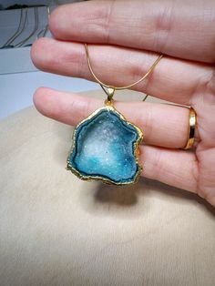 Beautiful one of a kind geode necklace. ♡ This statement piece will catch eyes wherever you go! ★ The geode necklace you see in the pictures is the same one you'll receive. Chain: 20 inch Gold Plated Stainless Steel Chain Geode: 24K Gold Plated All natural crystals contain some inclusions, cracks, scratches, chips and discolorations. There can be variations of size, weight, shape and color. Please review the photos for details or reach out if you have any questions! ❀ Care Instructions: - Please Elegant Hand-strung Agate Necklace, Gold Hand-strung Agate Necklace, Geode Pendant Necklace, Luxury Agate Statement Necklace, Bohemian Hand-strung Agate Crystal Necklace, Geode Necklace, Geode Earrings, Druzy Earrings, Agate Earrings