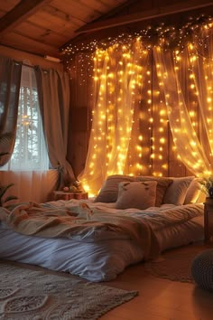 a bedroom with lights hanging from the ceiling and curtains on the windowsill, along with a bed