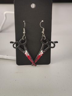 These Bloody Scissor earrings are a super cute addition to a spooky outfit! They would also make great gifts!  Please avoid getting them wet as it may damage the item Scissor Earrings, Etsy Earrings Dangle, Favorite Jewelry, Jewelry Earrings Dangle, Dangle Drop Earrings, Dangle Earrings, Super Cute, Great Gifts, Accessory Gift