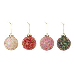 three different colored ornaments hanging from hooks