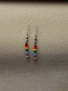 Seed bead size 8/0. 925 sterling silver hooks. Adjustable Rainbow Sterling Silver Jewelry, Nickel-free Round Rainbow Beaded Earrings, Everyday Rainbow Beaded Jewelry, Hypoallergenic Multicolor Sterling Silver Earrings, Adjustable Hypoallergenic Beaded Earrings, Everyday Sterling Silver Beaded Jewelry, Rainbow Round Beads Dainty Jewelry, Rainbow Dangle Earrings For Everyday, Nickel-free Rainbow Round Bead Jewelry