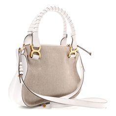 This is an authentic CHLOE Canvas Calfskin Small Marcie Satchel in White. This stylish satchel is crafted of beige canvas and calfskin leather in white. The bag features wrapped leather handles on either side with a frontal flap pocket, aged brass hardware, and an optional shoulder strap. The top zipper opens to a beige fabric interior with a zipper pocket. Aged Brass Hardware, Beige Fabric, Leather Handles, Aged Brass, Brass Hardware, Blue Bags, Leather Handle, Flap Pocket, Saddle Bags