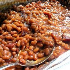 baked beans in a pot with spoons