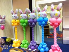 some very cute looking balloons in the shape of bunnies with bunny ears on them