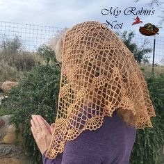 a woman wearing a crochet head net