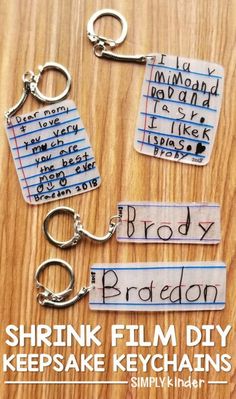 four key chains with words on them and the words shrink film dispensers