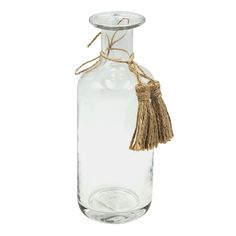 a clear glass bottle with a rope tied around the top and bottom, on a white background