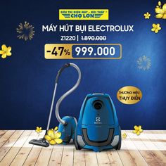 a blue and black vacuum with yellow flowers on the floor next to it is an advertisement for a new appliance