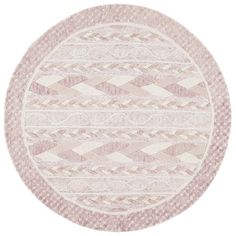 a round rug with white and pink patterns on the top, in front of a white background