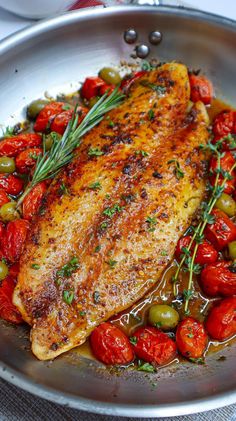 chicken with tomatoes and olives in a pan