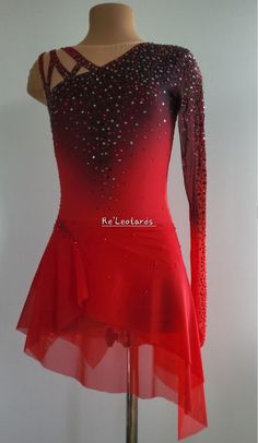 a red and black dress with sequins on it