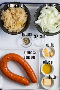 the ingredients to make a hot dog on a tray