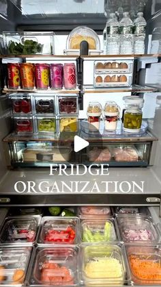 a refrigerator filled with lots of food and containers on top of it's shelves