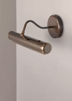 an image of a door handle on the side of a house or office building with white walls