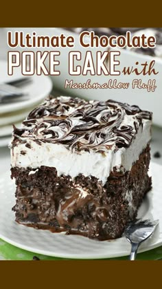 the ultimate chocolate poke cake with marshmallow frosting on top is ready to be eaten