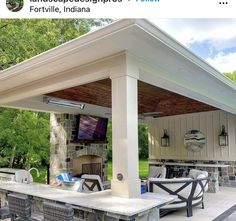 an outdoor kitchen and grill area is featured in this instagramted post by facebook