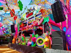 an elaborately decorated bus with lots of colorful decorations