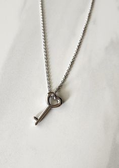 Heart Key Necklace Stainless Steel Dimensions Pendant: 23X11 mm Necklace: 17.5" Length Durable and comfort to wear, no matter what the occasion. * Hypoallergenic * High quality Stainless Steel 316L * Tarnish-Resistant, it doesn't leave stains on your skin. * Easy to clean with soft cloth Thanks for your visit! <3 Minimalist Birthday, Key Pendant Necklace, Heart Key, Heart And Key, Key Necklace, Key Pendant, Mom Gift, Christmas List, Heart Shape