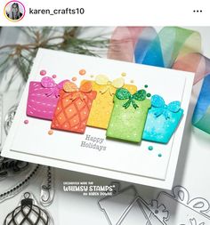 a card with colorful gift bags on it and some ribbon around the edges that says happy holidays