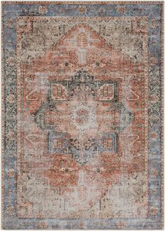 an orange, blue and grey rug with medallions on the middle in different colors