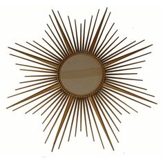 a sunburst shaped mirror is shown against a white background